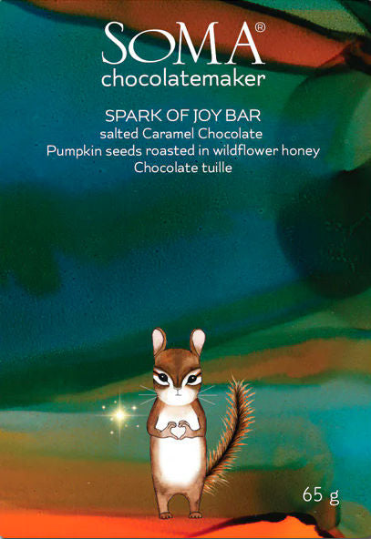 Soma Spark of JOY Milk Chocolate with caramel & wildflower honey-roasted pumpkin seeds